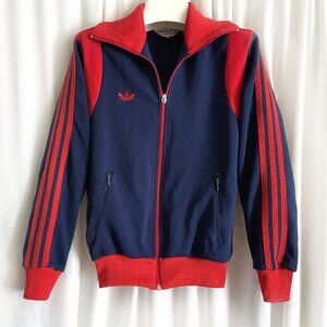 Adidas kids sport jacket. Dark blue with red accents.  Size: 100 cm